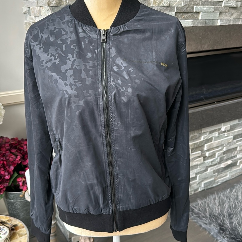 Superdry Warmup Jacket Size Medium. Shimmery Gray and black leopard.New w/o tags